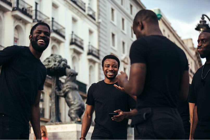 A group of happy guys hanging out together